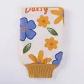 Dickes Peeling-Badhandschuh mit buntem Gänseblümchen-Druck und gelbem Rippbündchen - Gelb Blumig