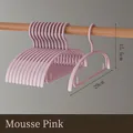 Pink child-sized non-slip plastic hangers, 29cm wide, no-trace design for clothes. - Pink