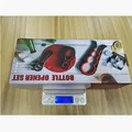 Multifunctional bottle opener set in retail box on digital scale weighing 477.6g - 6-Piece Set / Black Red