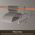 Detail view of grey children's clothes hangers showing 29cm width dimensions - Gray