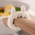 Beige rabbit-shaped silicone utensil rest and pot lid lifter for spill-proof cooking - Spatula Holder / White