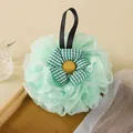 Mint green sunflower bath sponge featuring soft exfoliating mesh and a gingham flower center - Sun Flower Shape / Green