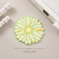Yellow and green daisy-shaped soft rubber heat insulation coaster with 90mm diameter. - Daisy / Coaster