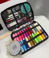 Portable travel sewing kit featuring multi-color thread spools and essential DIY tools - White Printed Bag Upgrade / 128-Piece Set / White