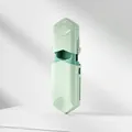 Portable retractable pill cutter in mint green finish for easy travel medication splitting - Green