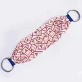 Durable long exfoliating back scrubber with 'Rich' print and sturdy grey handle loops - As You Wish