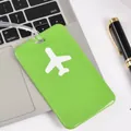 Green rectangular soft PVC luggage tag featuring a white airplane icon and clear strap - Green