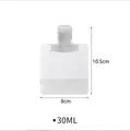 Detail view of portable 30ml travel squeeze pouch showing dimensions 10.5cm by 8cm - 30ml / Small - 30ml Thick Version / White