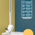 White long-handled toilet brush with grey bristles on a marble base, wall-mounted style. - Gray