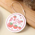 Compressed wood pulp cotton dish sponge with cute persimmon pattern and hanging loop - 9cm / Good Things Happen (Persimmon)