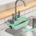 Detail showing light blue silicone faucet draining rack with 27x14x5cm dimensions - Light Blue