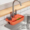Detail view of an orange silicone faucet drainer tray with dimensions 27x14x5cm. - Orange