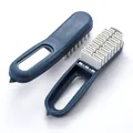 Dual-sided suede shoe cleaning brush with white rubber eraser head and navy blue handle - Blue