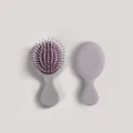 Mini cepillo de pelo portátil con masaje de cojín de aire para niñas en gris y rosa - Café