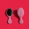 Mini cepillo de pelo rosa con cojín de aire, masajeador y cerdas negras antiestáticas - Burdeos
