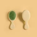 Mini spazzola per capelli massaggiante antistatica portatile color crema e verde - Verde chiaro