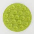 Green silicone suction cup mat with non-slip double-sided grip for household kitchen. - Green