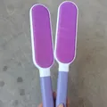Set of two purple double-sided pet hair and lint removers for clothes and bedding fabrics - M / Purple