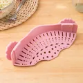 Pink silicone clip-on pot strainer for easy kitchen draining of pasta and food - Pink