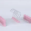 Set aus rosa rutschfesten Hosenspannern mit verstellbaren Clips für Röcke und Kleidung - 10er-Set / Rosa