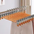 Durable orange stainless steel non-slip pants hanger featuring strong grip metal clips - Single Piece / Gold