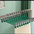 Durable green non-slip pants hanger with adjustable metal clips for skirts and JK uniforms. - Single Piece / Dark Green
