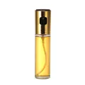 Premium glass oil sprayer bottle with gold metallic pump for healthy cooking and BBQ grilling - 100ml / Gold