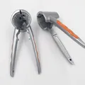 Silver zinc alloy funnel-type nutcracker with orange non-slip silicone handle grips - Orange