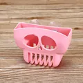 Skull-shaped pink sponge holder with suction cups for efficient kitchen drainage - Two Hole Storage Rack / Pink