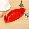 Red silicone clip-on pot strainer colander for draining pasta and vegetables easily - Red
