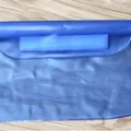 Detail view of a blue PVC waterproof phone pouch featuring a secure velcro closure strap - Dark Blue