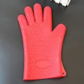 Red thickened heat-resistant silicone oven mitt with heart-shaped grip texture. - Red