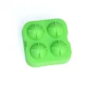 Durable green 4-hole sphere ice cube mold made of food-grade silicone for easy release - 4 Hole Ice Ball Mold / Green