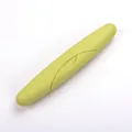 Portable light green travel toothbrush storage case with secure lid and sleek design - Green