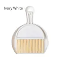 Mini desktop broom and dustpan set in ivory white with a cute smiley face design - Mini Desktop Style / White