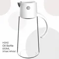 650ml glass oil bottle dispenser with khaki white lid and handle for kitchen use - 650ml