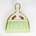 Mini desktop cleaning set featuring a small broom and dustpan in light green and beige - Green Dustpan Brush