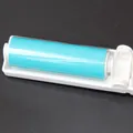 Portable foldable and washable lint roller for clothes cleaning in cyan and white - Blue