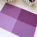 Modern purple checkered PVC placemat featuring heat-resistant texture for dining tables - Purple