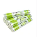 Stack of transparent plastic wrap rolls for food storage and preservation - Cling Film Refill
