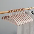 Ergonomic pink plastic clothes hangers for wet and dry use with non-slip curved design - Wide Shoulder Thickened Seamless Style / Pink