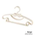 Durable beige plastic clothes hangers with cute bow design for adult garment storage - 5 Pieces / White