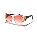 Modern rimless sunglasses with red gradient lenses and gold decorative metal accents - Black Temple Double Red Lens
