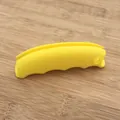 Ergonomic yellow silicone grocery bag handle grip designed for comfortable heavy lifting - Yellow