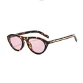 Stylish vintage cat eye sunglasses featuring tortoiseshell frames and light pink lenses - Tortoiseshell Frame Pink Lens