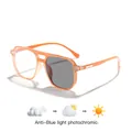 Kids' orange pilot-style glasses featuring anti-blue light and photochromic color-changing lenses - Orange