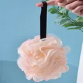 Large peach-colored mesh bath sponge with soft texture and hanging loop - Patchwork Pink