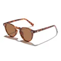 Vintage round tortoiseshell sunglasses featuring brown lenses and full UV protection. - Tortoise Frame Tea Lens