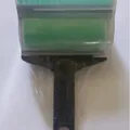 Reusable green washable hand-held lint roller for pet hair removal in plastic packaging - Large Brush / Black