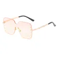 Oversized pink gradient rimless sunglasses with gold rivet accents and metal temples. - Gold Frame Pink Yellow